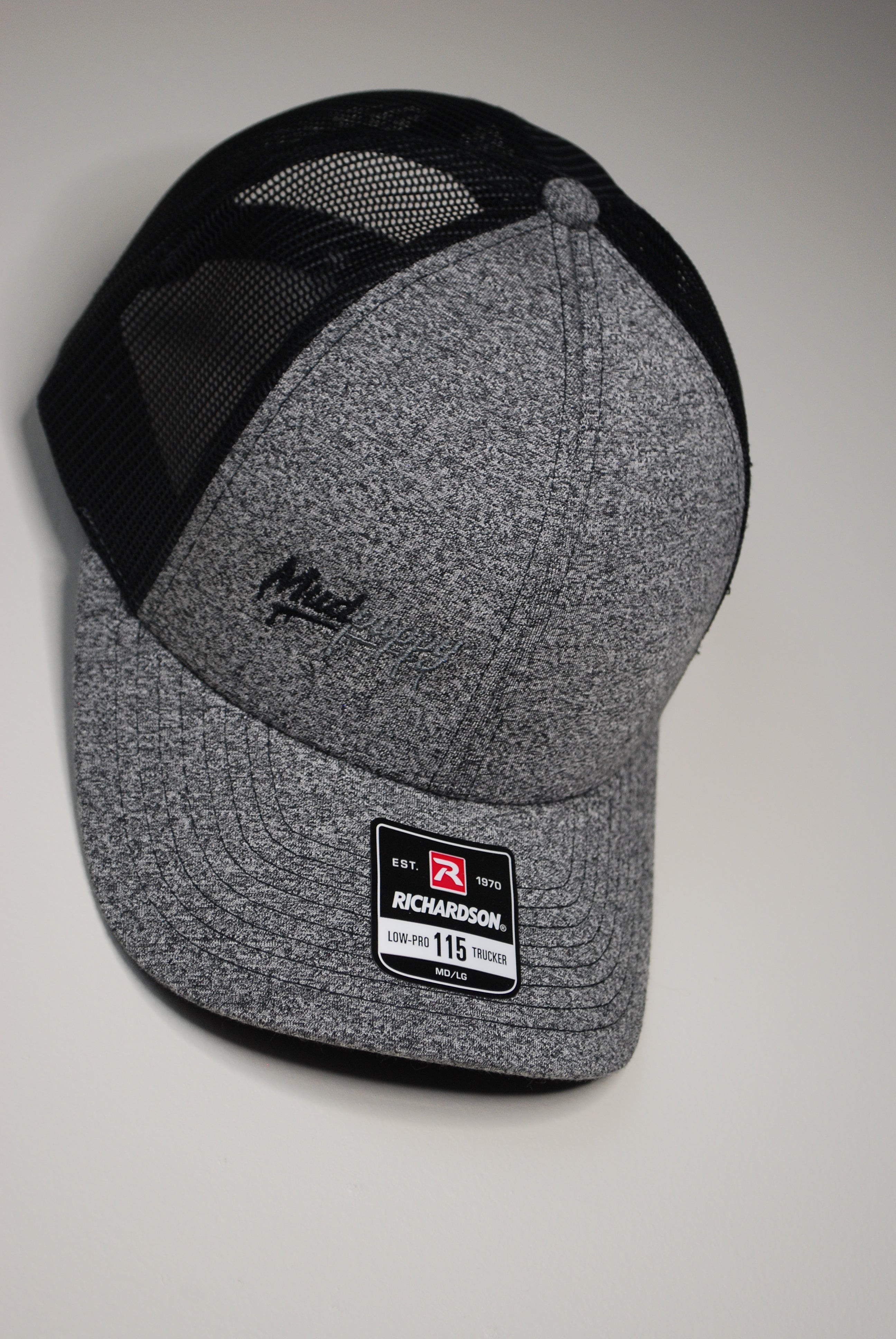 GREY AND BLACK MUDPPY HAT